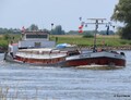 Adelante afvarend op de IJssel bij Bronckhorst.