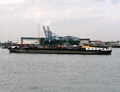 Okuporos vaart de 2e Petroleumhaven in bij Pernis.