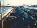 Vulcaan 66 links in de Waalhaven te Rotterdam langzij een geladen 3000 tonner