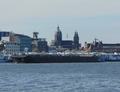 De IJburg II met de duwboot Zeemeeuw binnen IJ Amsterdam.