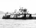 De CFNR 122 met de duwboot Pierre Brousse.
