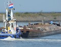 Onbekend met de duwboot Maas I in de Buitenhaven in Den Oever.