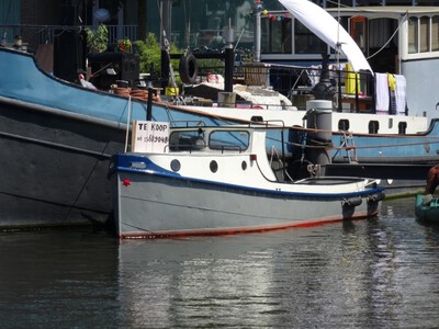 De onbekende sleepboot Amsterdam.